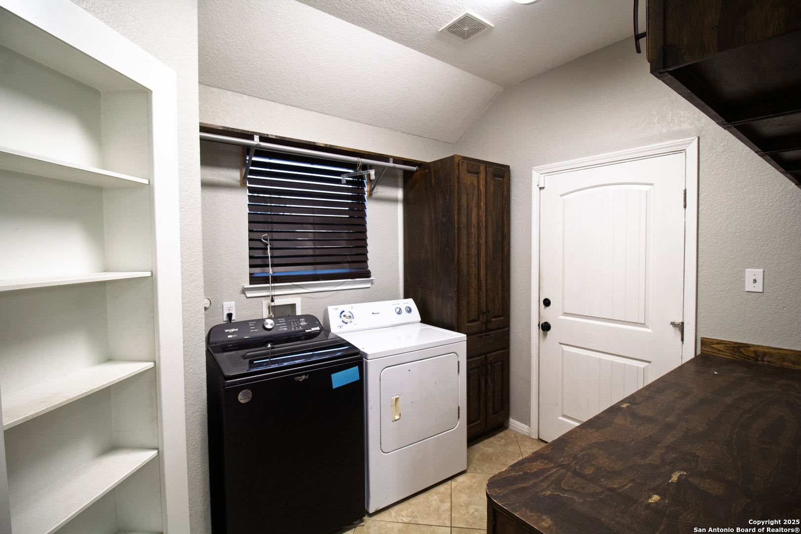 504 West Sullivan Street Skidmore, TX 78389 - Photo 27 of 35 a room with storage and utility