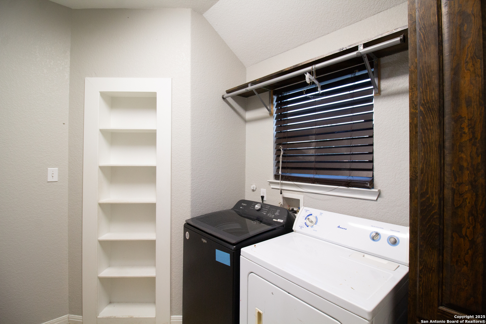 504 West Sullivan Street Skidmore, TX 78389 - Photo 28 of 35 a utility room with dryer and washer