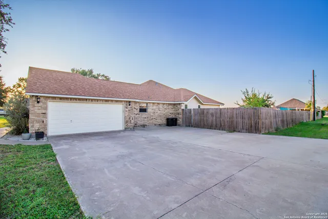 a house with yard in front of it