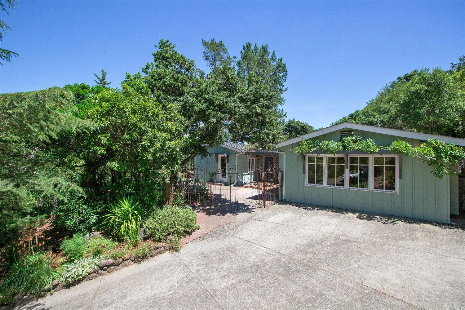 33 Raven Road San Anselmo, CA 94960 - Photo 1 of 1 front view of a house with a garden