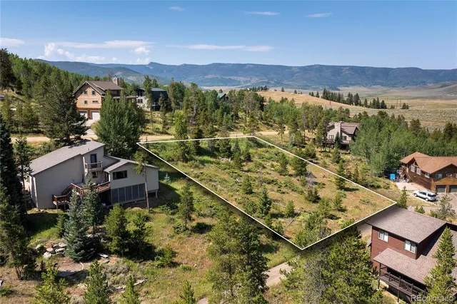 an aerial view of residential house with outdoor space and river