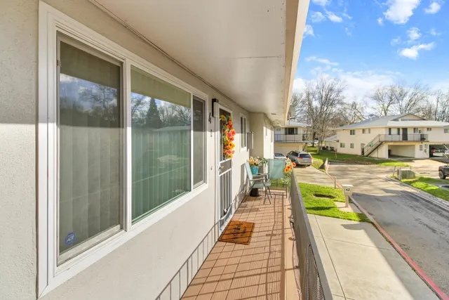 a view of a balcony with city view