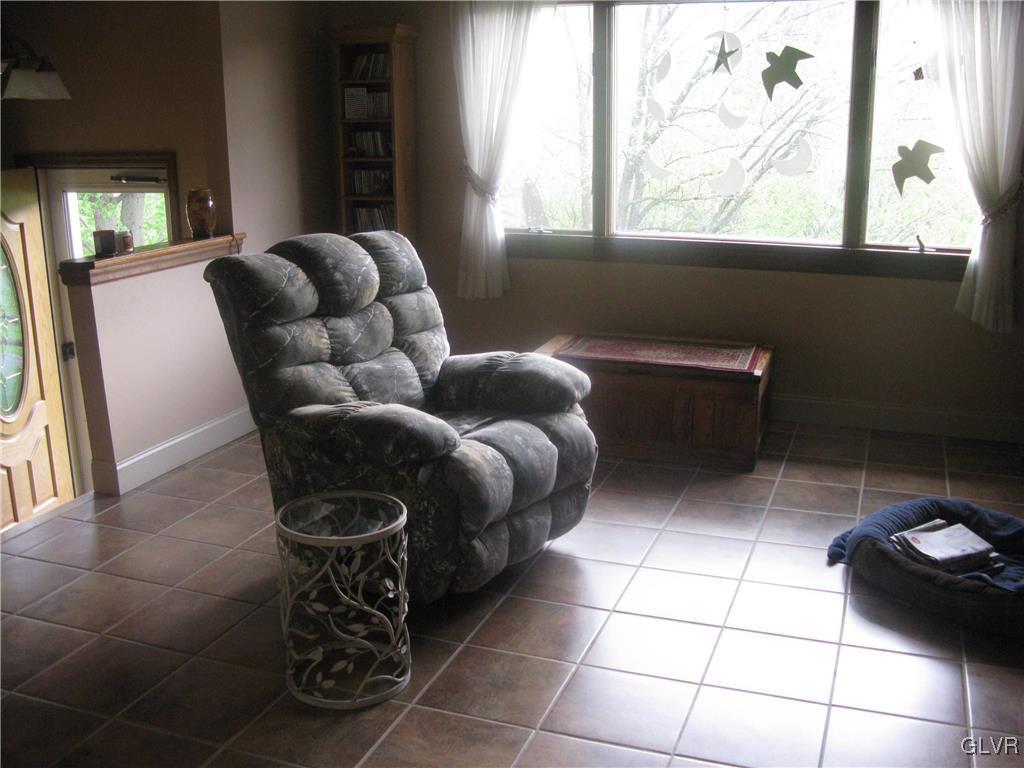 616 South Summit Road Bath, PA 18014 - Photo 15 of 22 a living room with furniture and a window