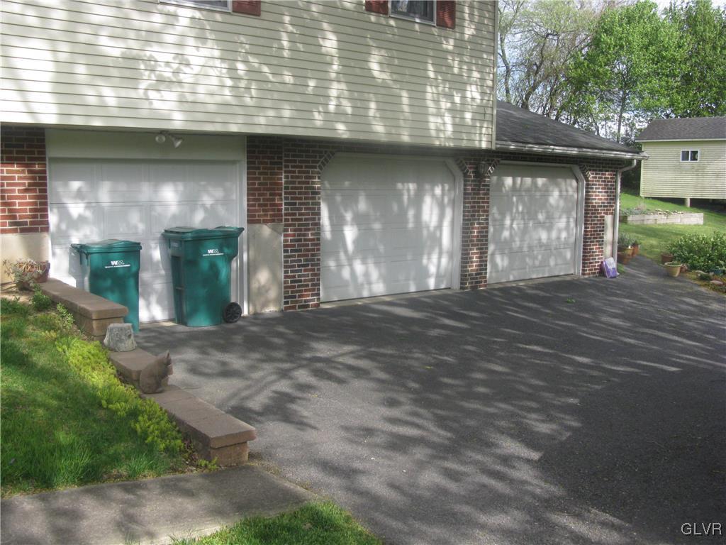 616 South Summit Road Bath, PA 18014 - Photo 3 of 22 a front view of a house with a yard