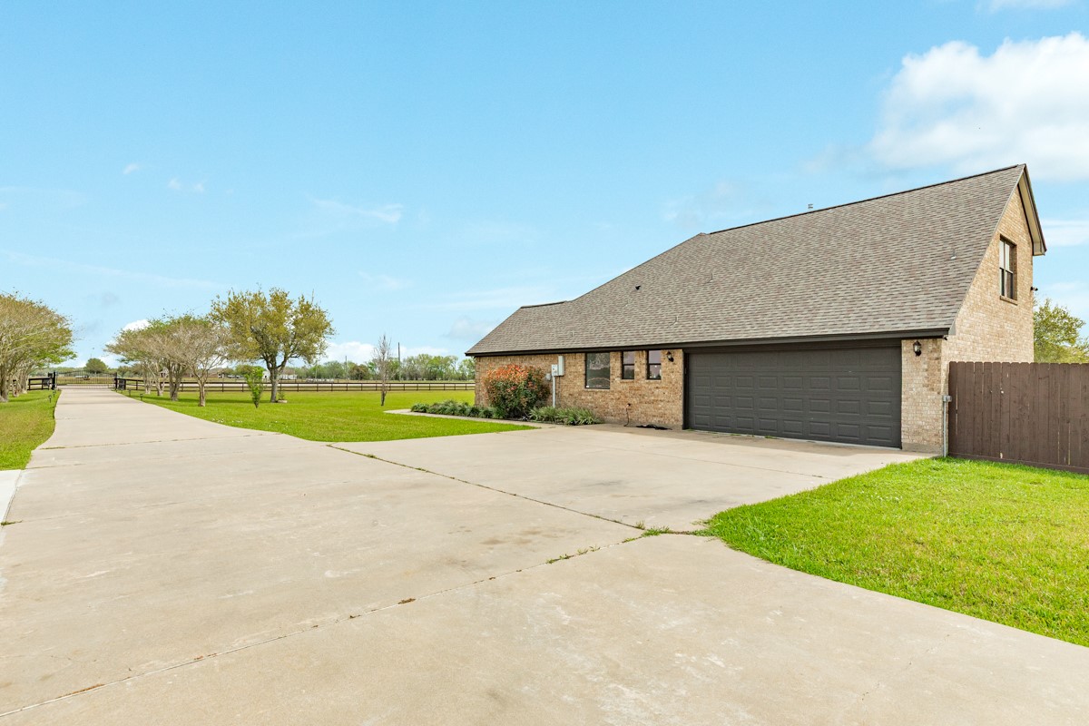 20111 Farm To Market Road 523 Angleton, TX 77515 - Photo 16 of 47 a house with yard in front of it