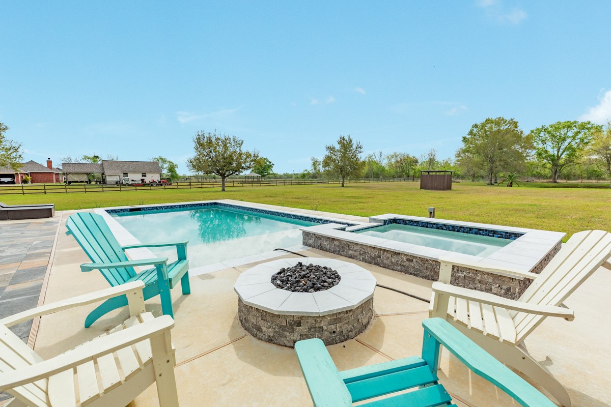 20111 Farm To Market Road 523 Angleton, TX 77515 - Photo 20 of 47 a view of a swimming pool and outdoor space