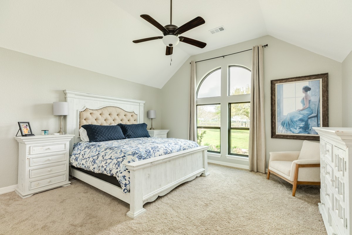 20111 Farm To Market Road 523 Angleton, TX 77515 - Photo 38 of 47 a spacious bedroom with a bed and a large window