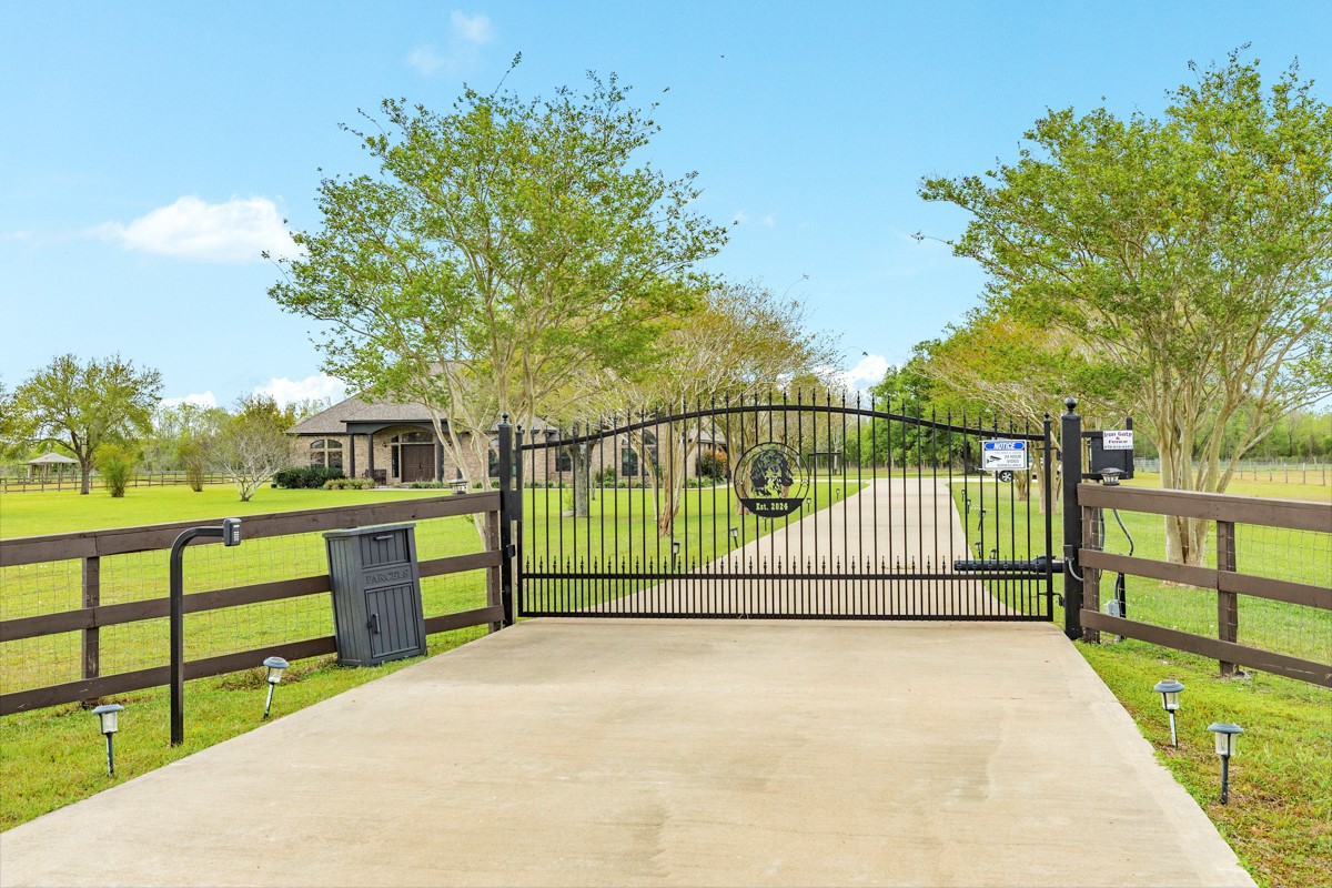 20111 Farm To Market Road 523 Angleton, TX 77515 - Photo 10 of 47 a view of a fence and trees