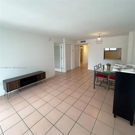 a living room with a couch and a coffee table