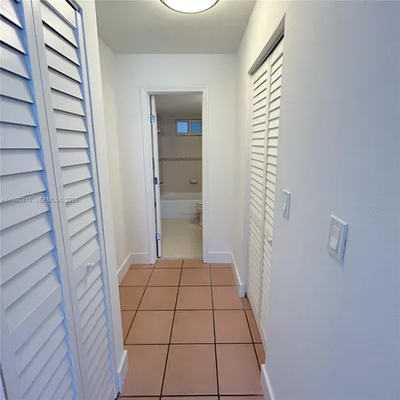 a bathroom with a toilet bathtub and shower
