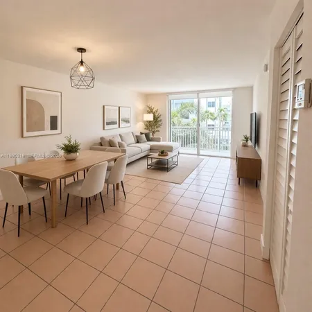a very nice looking dining room with a large window