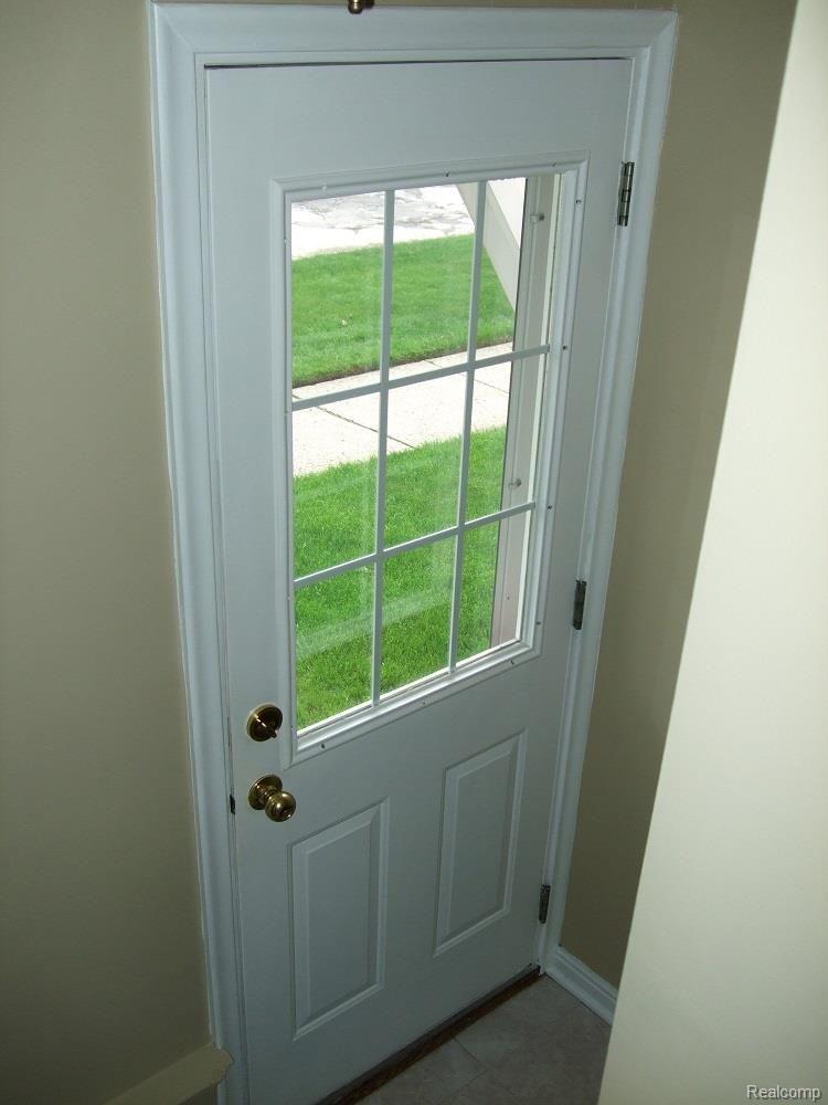 9406 Ruth Avenue Allen Park, MI 48101 - Photo 21 of 31 SIDE CUSTOM ENTRY STEEL DOOR.