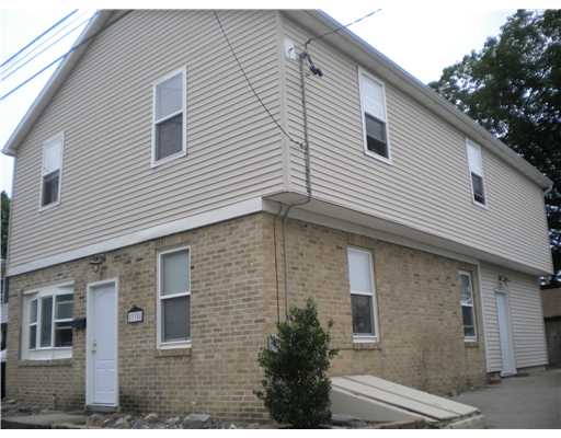 335 10th Avenue Woonsocket, RI 02895 - Photo 1 of 8 Exterior Front.