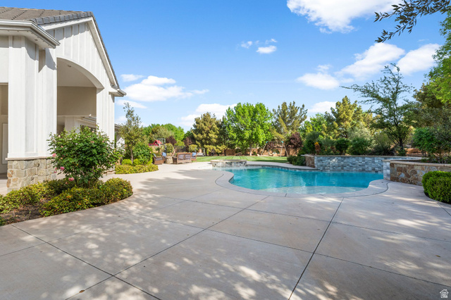 2917 Old Farm Road Washington, UT 84780 - Photo 34 of 105 Outdoor pool featuring a patio area and an in-ground hot tub