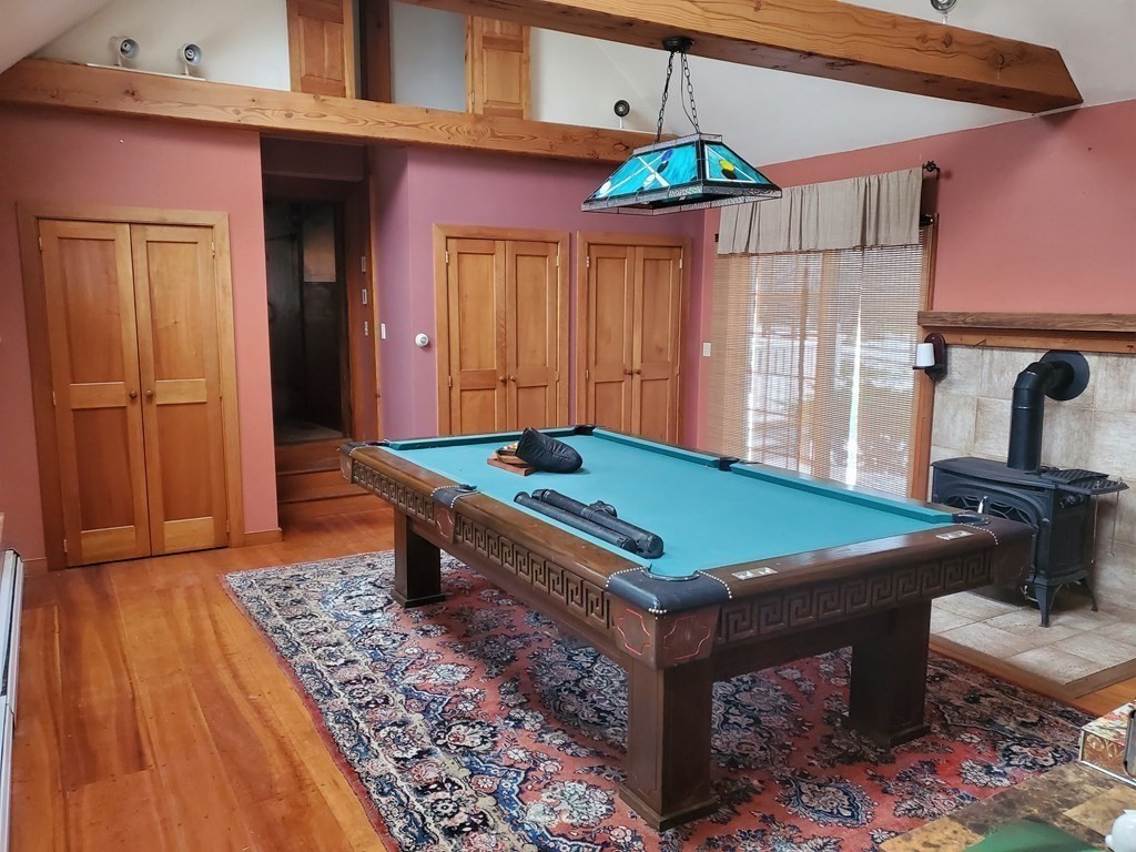 114 Davis Road Ashby, MA 01431 - Photo 17 of 32 a room with pool table and windows