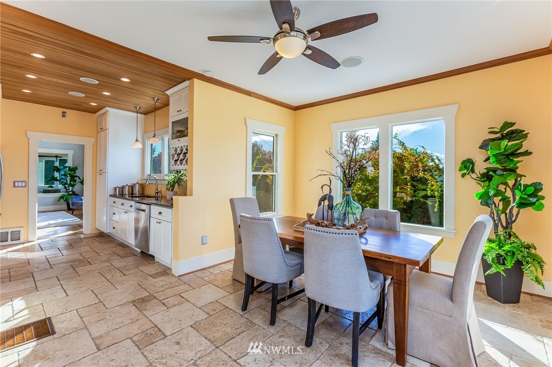 4140 Southwest Ida Street Seattle, WA 98136 - Photo 15 of 39 a view of a dining room with furniture window and outside view