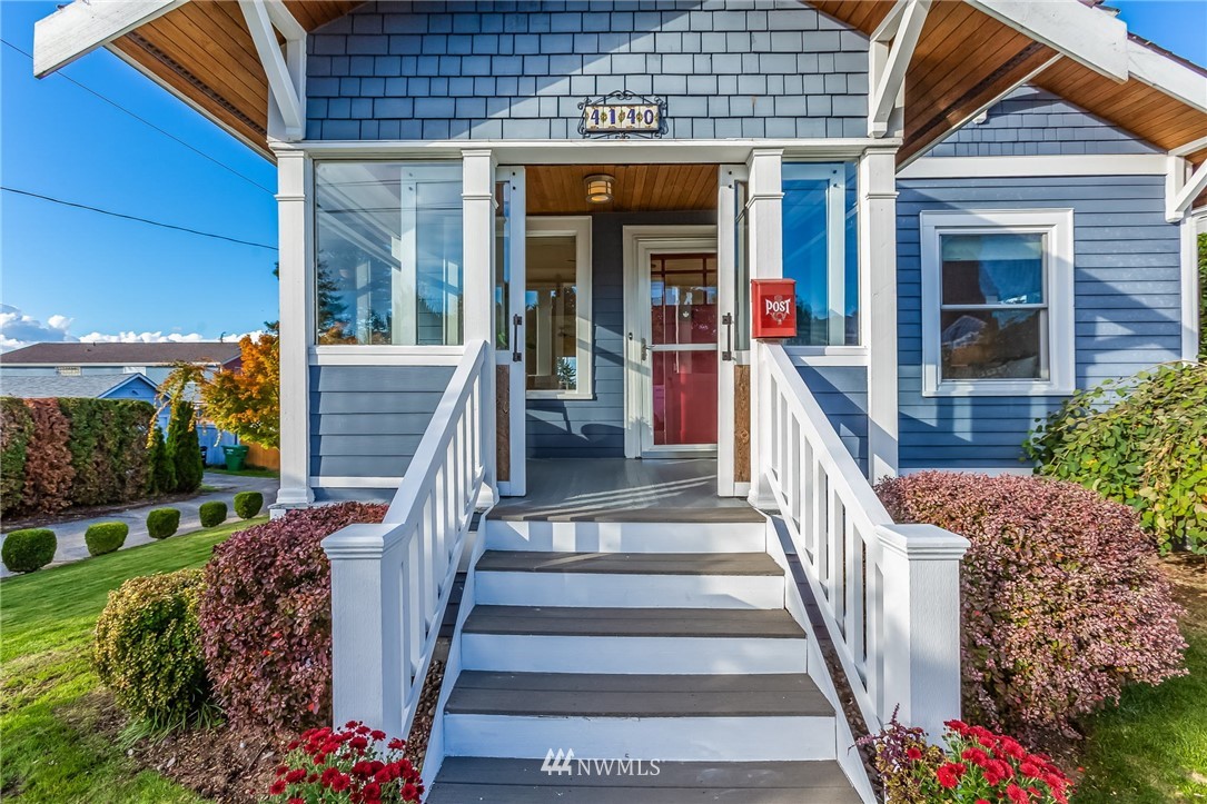 4140 Southwest Ida Street Seattle, WA 98136 - Photo 3 of 39 a view of a house with wooden stairs and potted plants