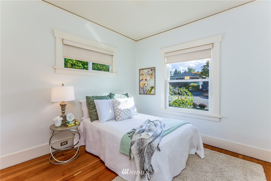 4140 Southwest Ida Street Seattle, WA 98136 - Photo 21 of 39 a bedroom with a bed and window