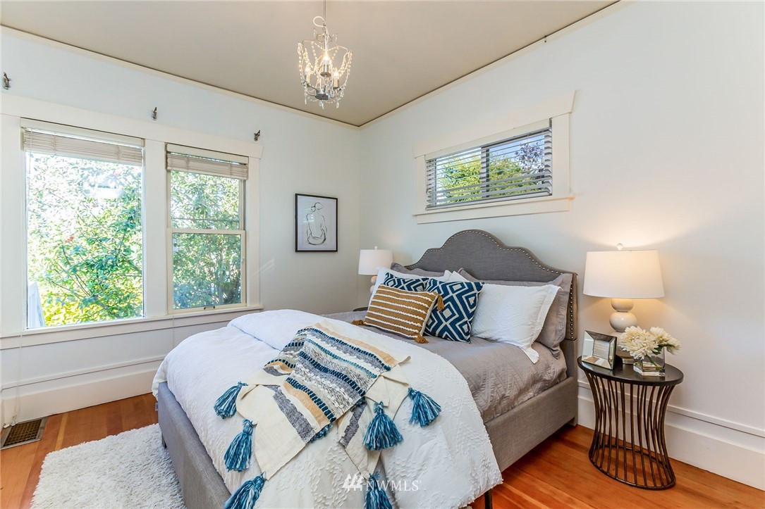 4140 Southwest Ida Street Seattle, WA 98136 - Photo 23 of 39 a bedroom with a bed and a window
