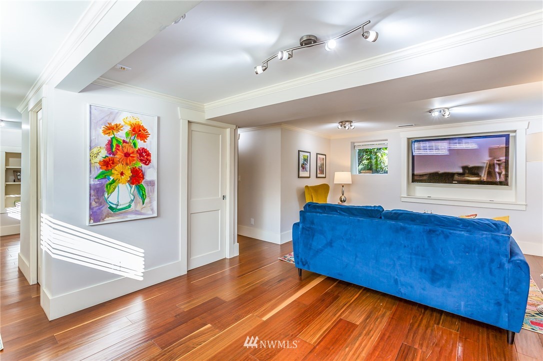 4140 Southwest Ida Street Seattle, WA 98136 - Photo 31 of 39 a living room with furniture and a flat screen tv
