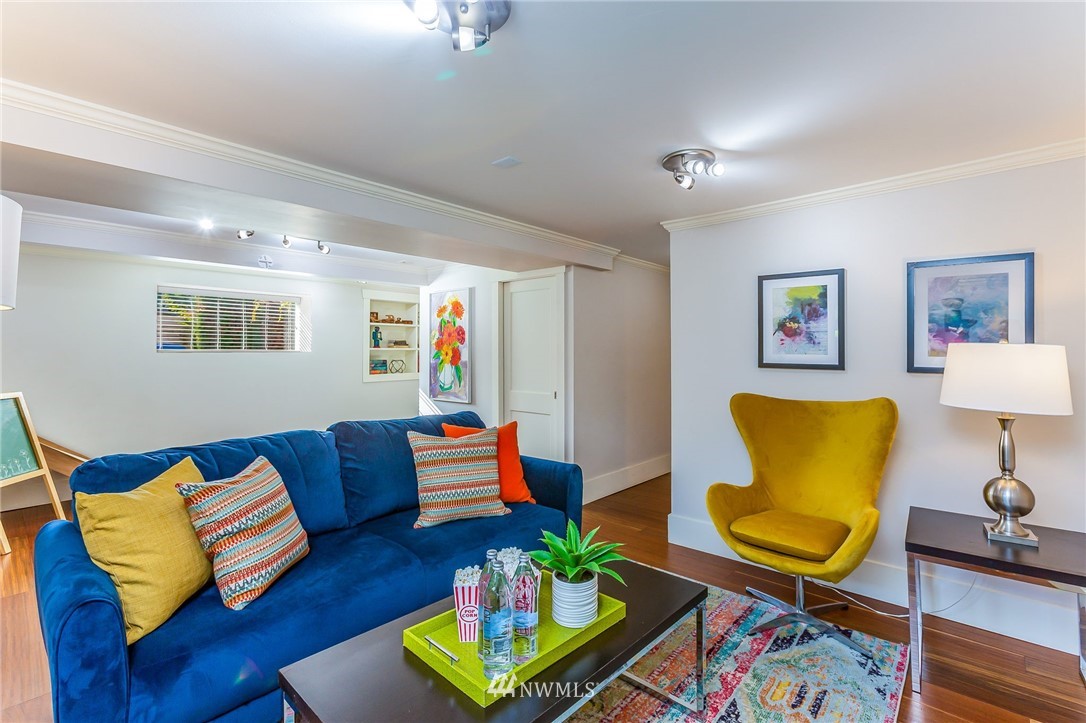 4140 Southwest Ida Street Seattle, WA 98136 - Photo 33 of 39 a living room with furniture rug and wooden floor