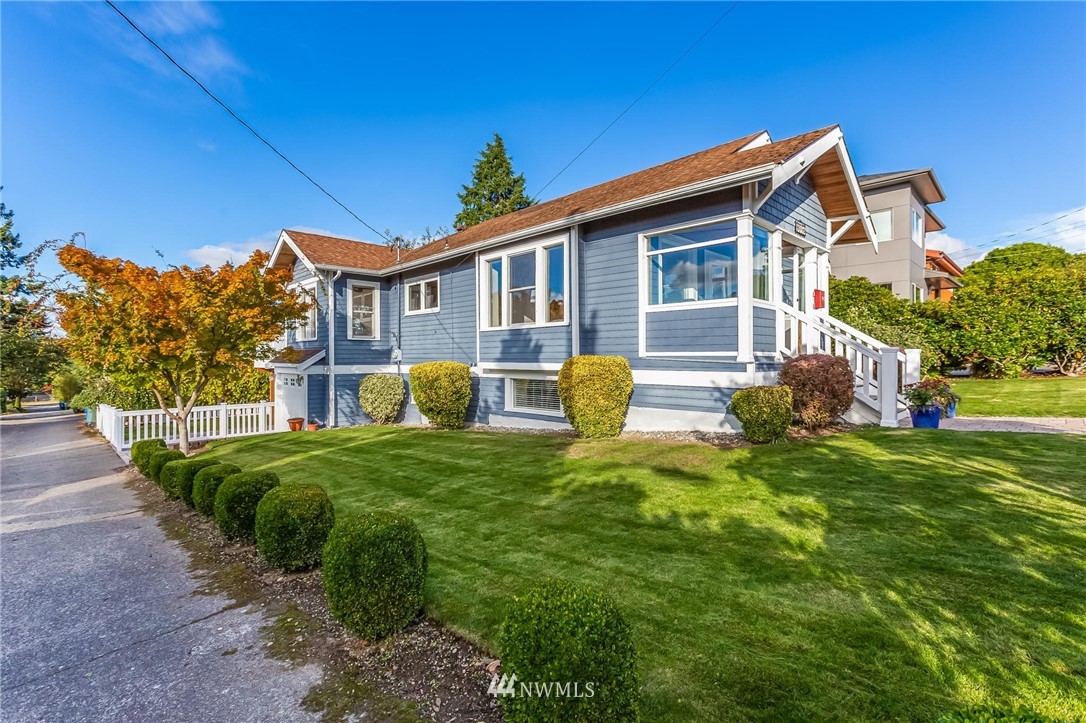 4140 Southwest Ida Street Seattle, WA 98136 - Photo 36 of 39 a front view of a house with a yard