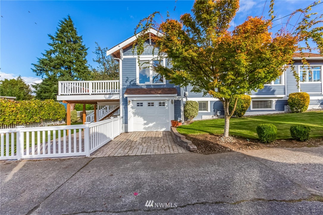 4140 Southwest Ida Street Seattle, WA 98136 - Photo 37 of 39 a view of a house with a yard and fence
