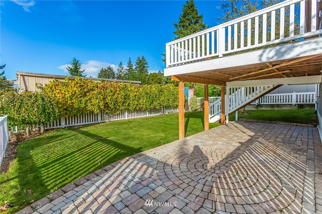 4140 Southwest Ida Street Seattle, WA 98136 - Photo 38 of 39 a view of a house with a yard