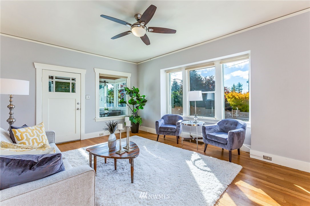 4140 Southwest Ida Street Seattle, WA 98136 - Photo 6 of 39 a living room with furniture and a large window