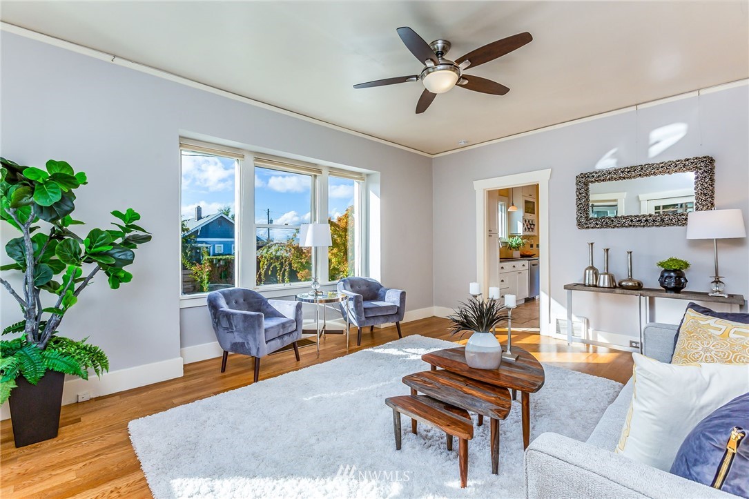 4140 Southwest Ida Street Seattle, WA 98136 - Photo 8 of 39 a living room with furniture potted plant and a large window