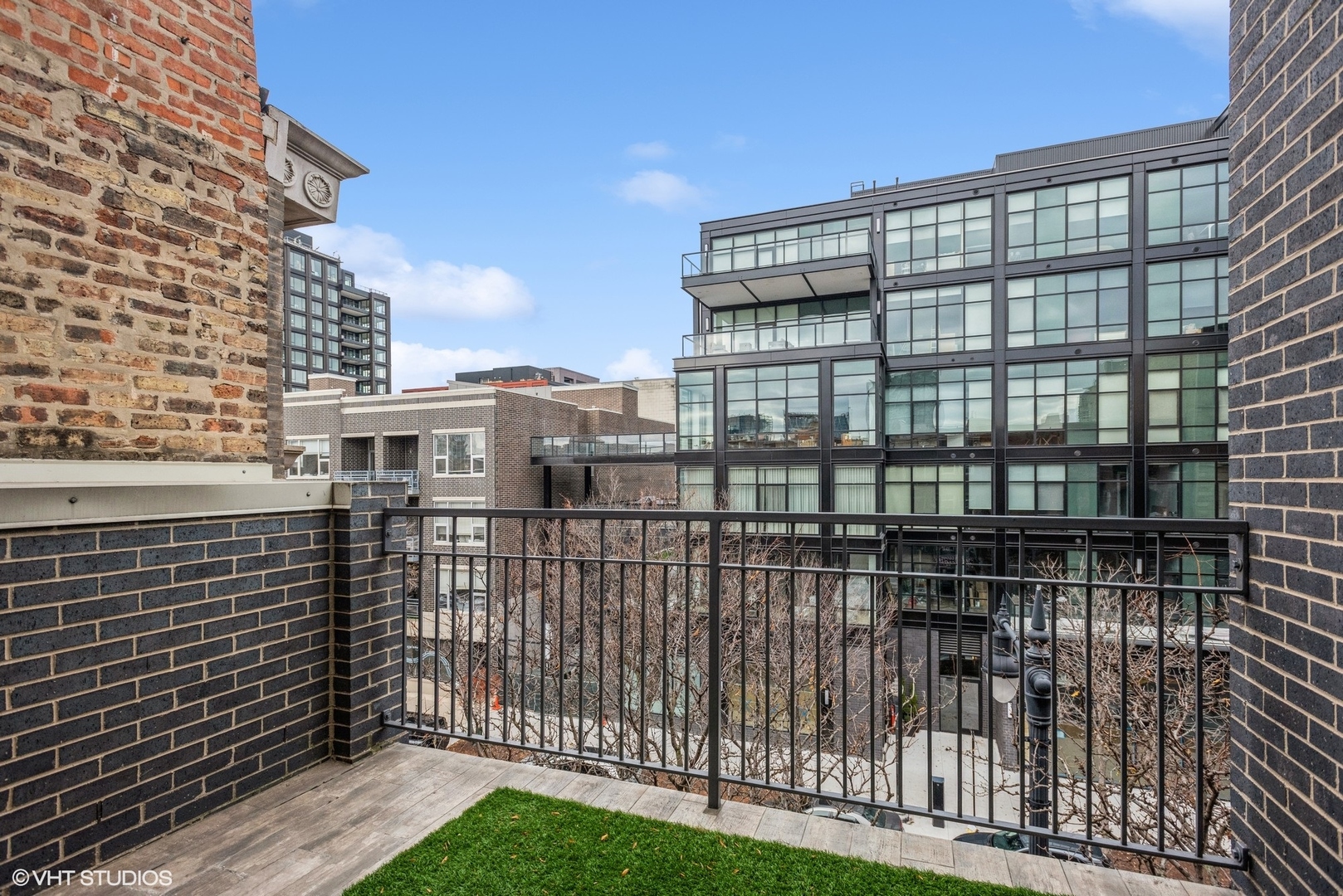 1041 West Madison Street, Unit 3 Chicago, IL 60607 - Photo 7 of 15 a view of a building from a balcony