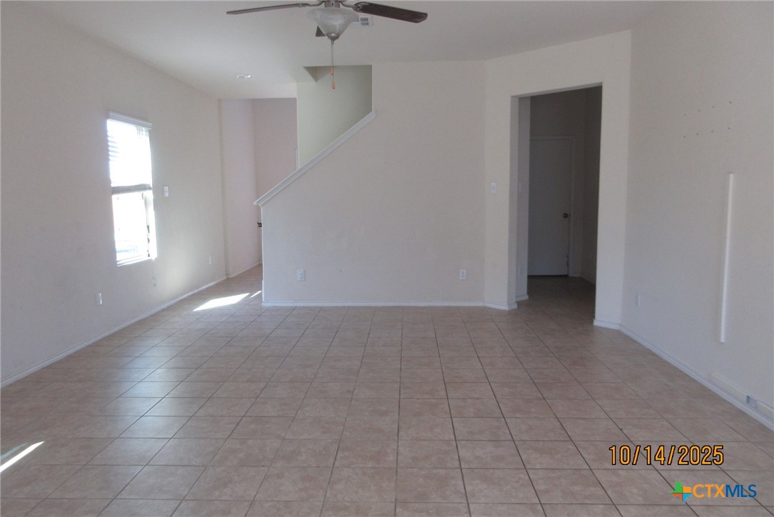 117 Open Sky Way, Unit 4D Jarrell, TX 76537 - Photo 15 of 36 an empty room with windows