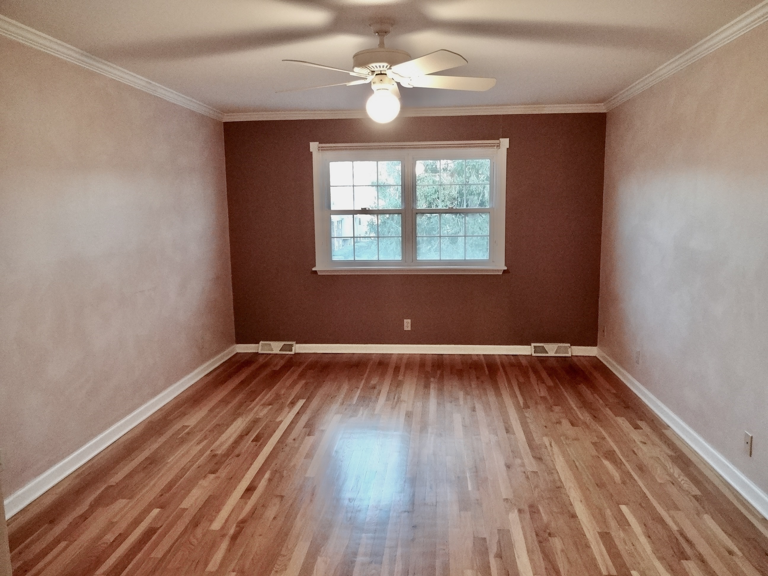 245 Unquowa Road, Unit 34 Fairfield, CT 06824 - Photo 19 of 24 wooden floor in an empty room with a window