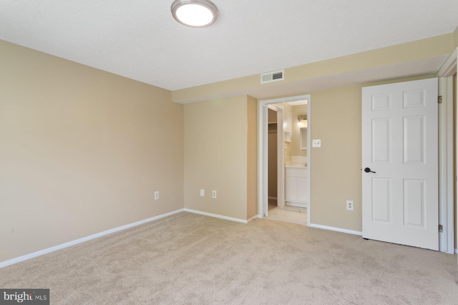731 L Heather Ridge Drive Frederick, MD 21702 - Photo 15 of 26 Large primary opens to remodeled bathroom.