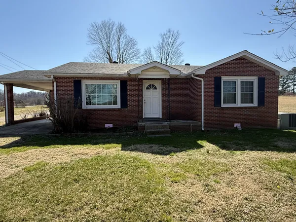 a front view of house with yard
