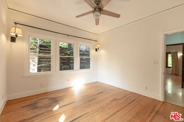 a view of a bathroom with a bathtub and shower