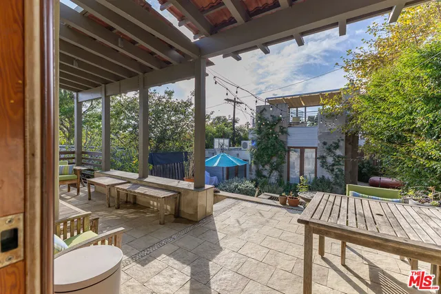 a outdoor space with lots of table and chairs