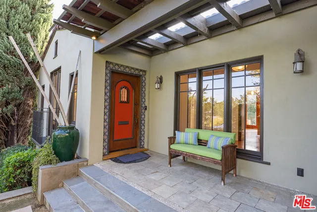 a house with outdoor seating space