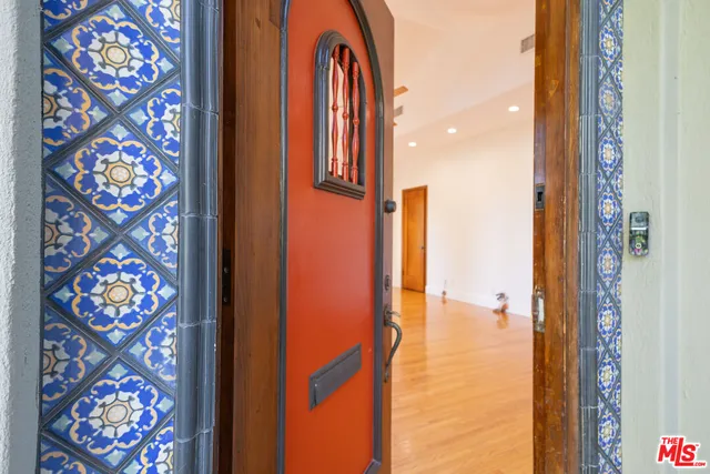 en suite bathroom with a sink and a mirror