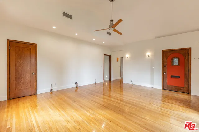 a view of an empty room and window