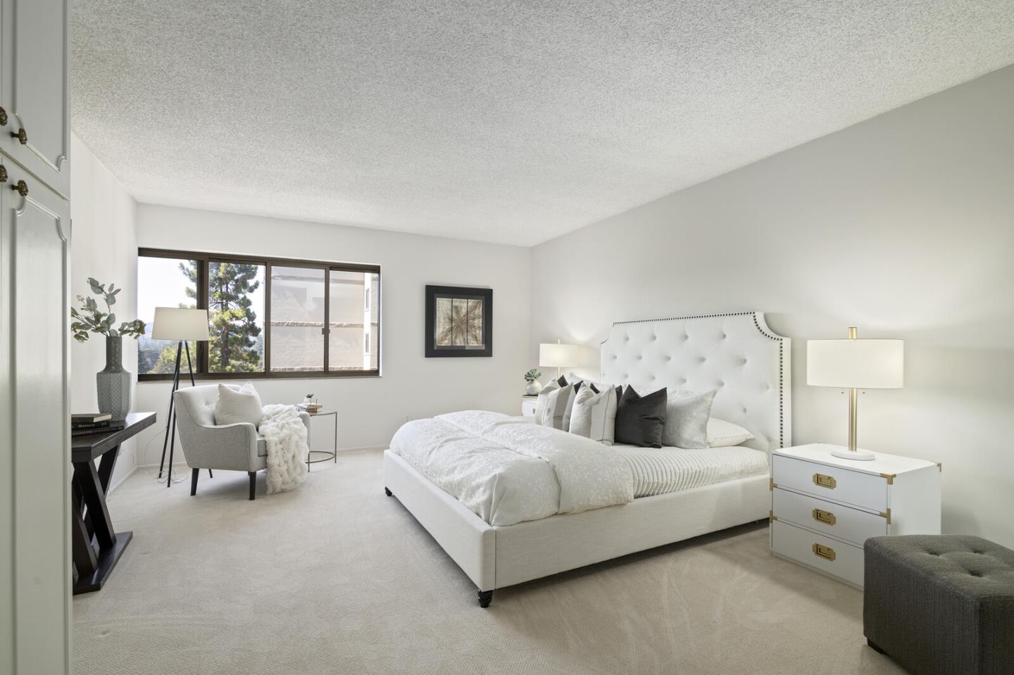 50 Mounds Road, Unit 415 San Mateo, CA 94402 - Photo 14 of 29 a bedroom with a bed and a large window