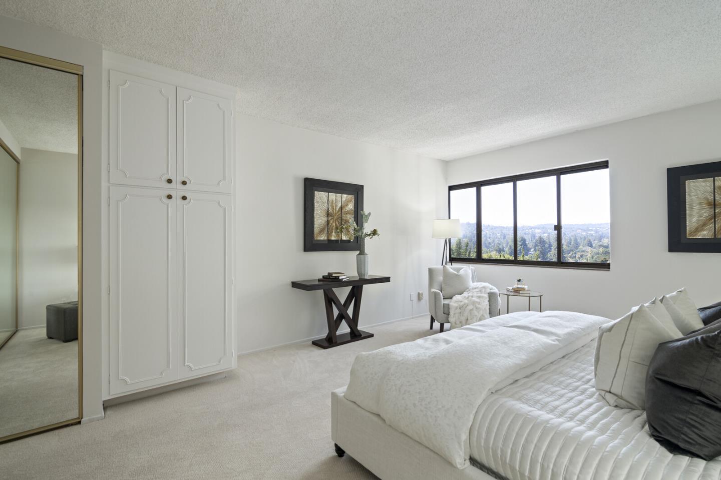 50 Mounds Road, Unit 415 San Mateo, CA 94402 - Photo 15 of 29 a bedroom with a bed and a large window