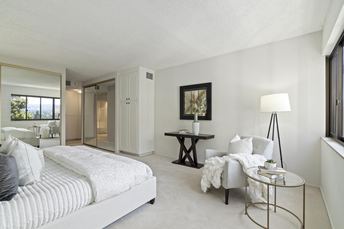 50 Mounds Road, Unit 415 San Mateo, CA 94402 - Photo 16 of 29 a bedroom with furniture and a lamp