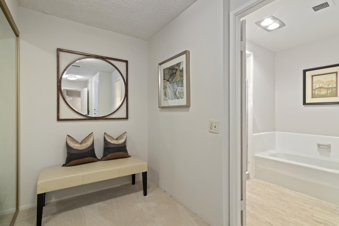 50 Mounds Road, Unit 415 San Mateo, CA 94402 - Photo 17 of 29 a bathroom with a tub and a mirror