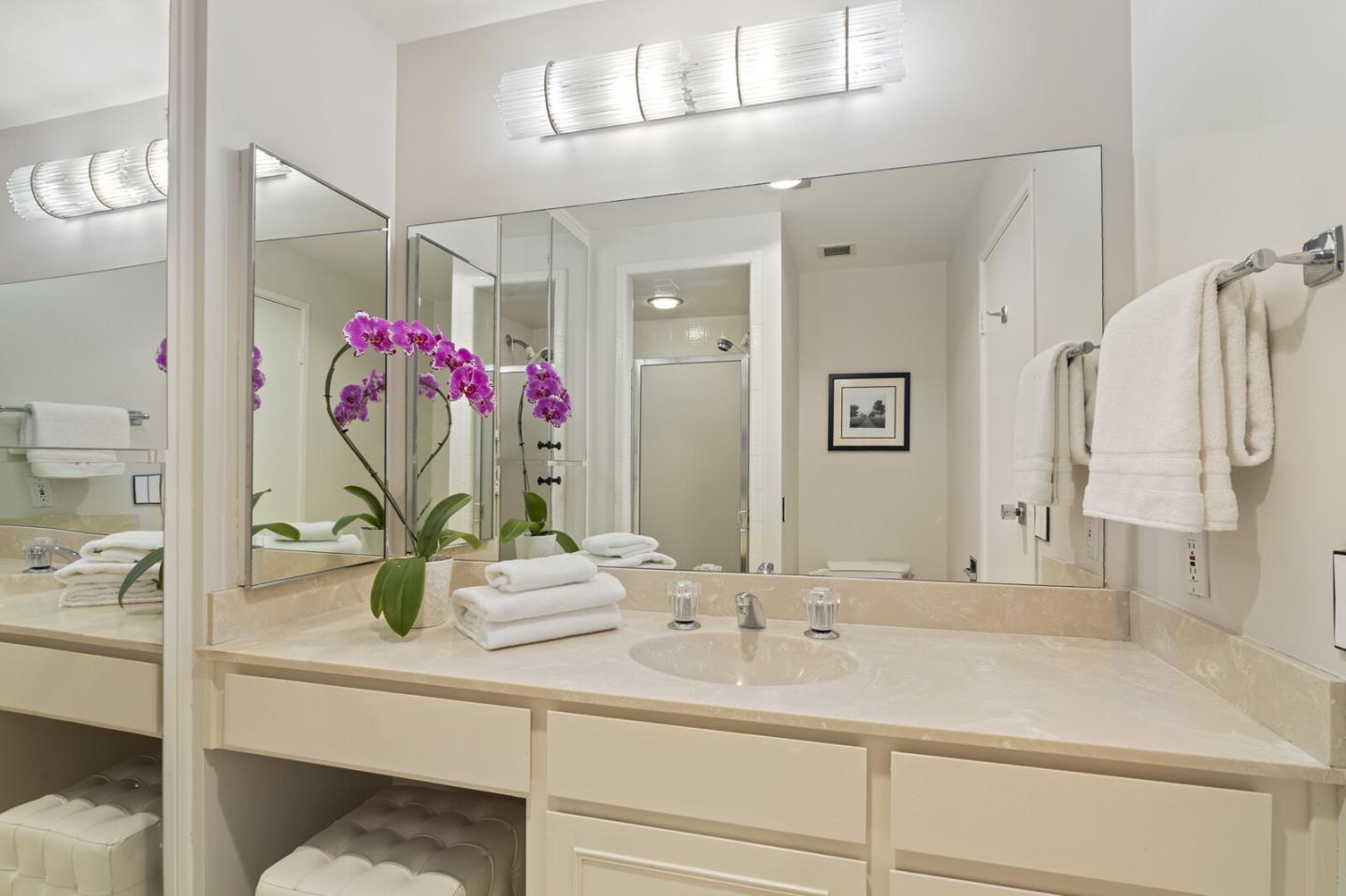50 Mounds Road, Unit 415 San Mateo, CA 94402 - Photo 19 of 29 a bathroom with a sink vanity mirror and tub