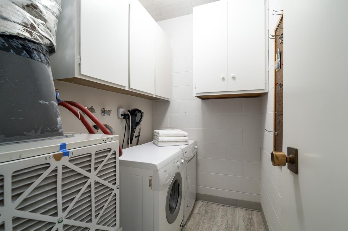 50 Mounds Road, Unit 415 San Mateo, CA 94402 - Photo 24 of 29 a utility room with dryer and washer