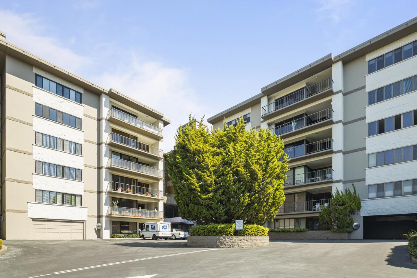 50 Mounds Road, Unit 415 San Mateo, CA 94402 - Photo 28 of 29 a front view of a building with a street