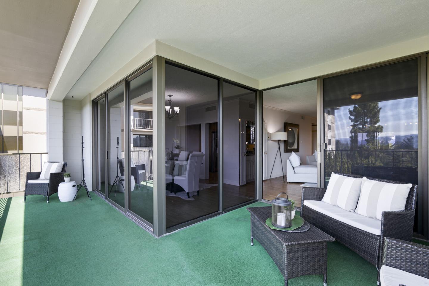 50 Mounds Road, Unit 415 San Mateo, CA 94402 - Photo 10 of 29 a living room with furniture and a large window
