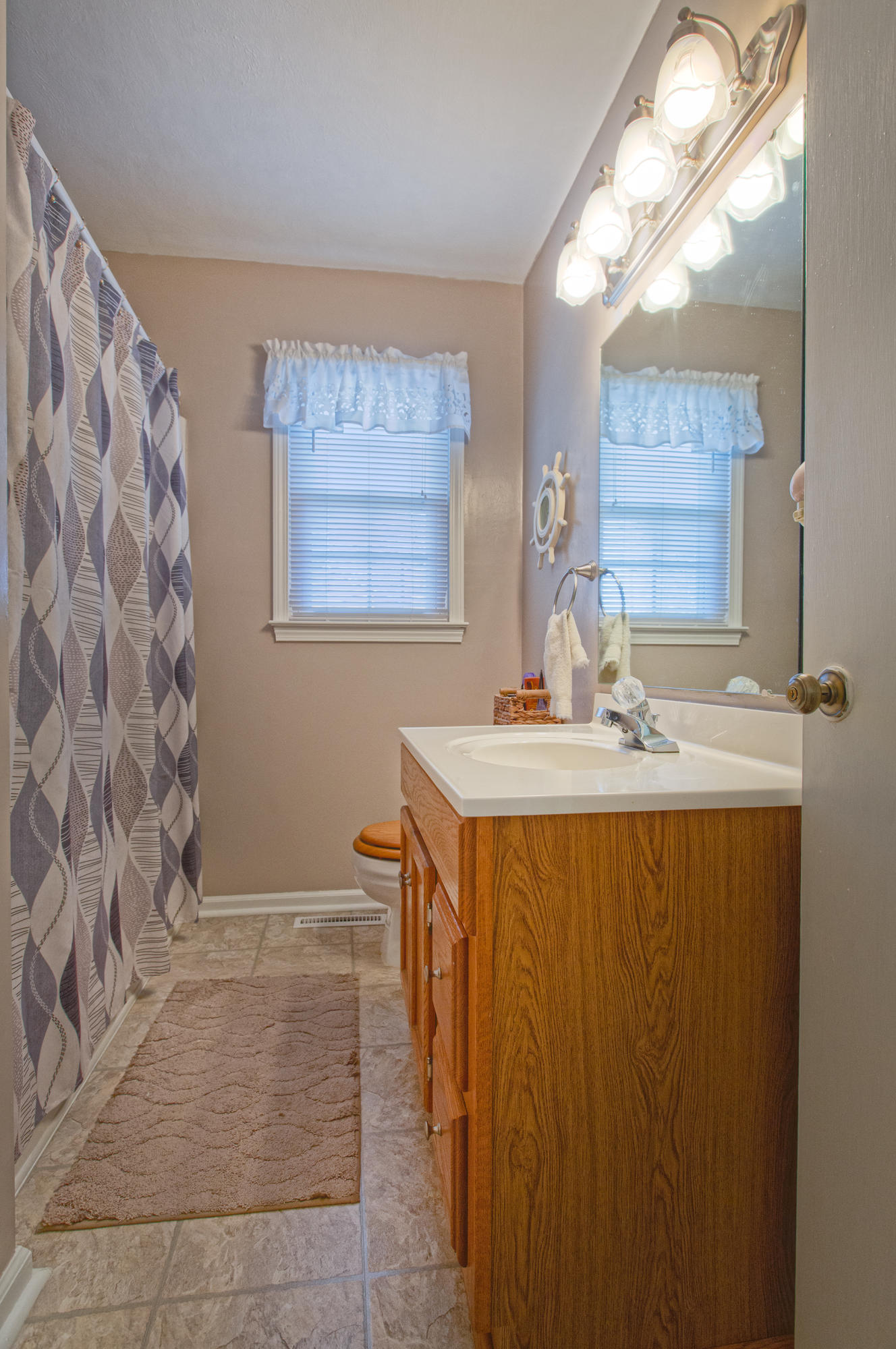 2015 Kiska Road Salem, VA 24153 - Photo 14 of 25 a bathroom with a sink and a mirror