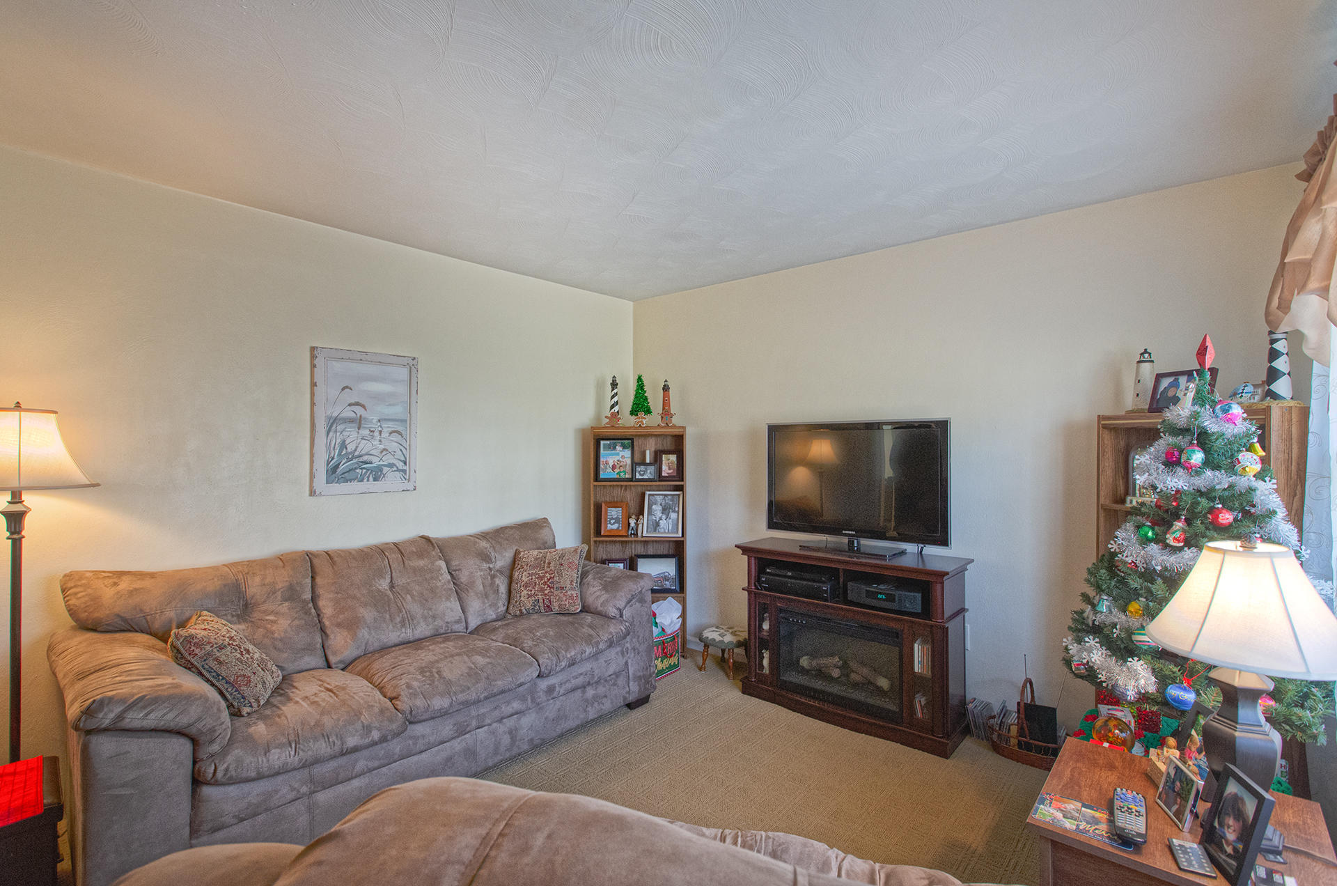2015 Kiska Road Salem, VA 24153 - Photo 4 of 25 a living room with furniture and a flat screen tv